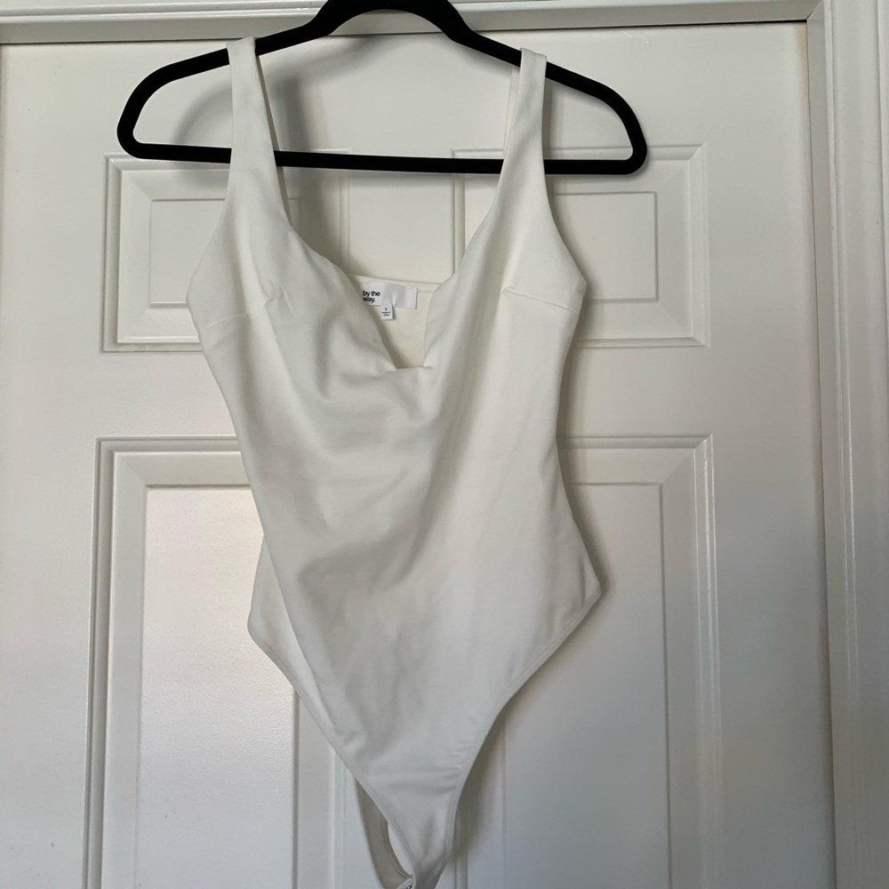 “by the way” white onesie